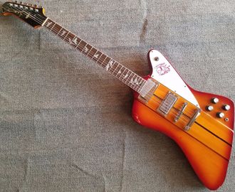 Chine Firehawk usine personnalisée Guitare Firebird étranger Guitare électrique de haute qualité en rouge instruments de musique fournisseur