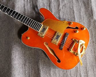 Chine magasin fait sur commande d'instrument de musique de guitare électrique de pont en or de touche de bois d'ébène de trou du corps f de cavité de TL d'orange fournisseur