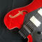 Une nouvelle guitare électrique sans tête de haute qualité avec tigre rayé en rouge fournisseur