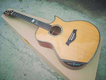 Chine Soundhole personnalisé pour guitare EQ AAAA tout solide coupé unique personnalisé cocobolo guitare électrique acoustique en bois fournisseur