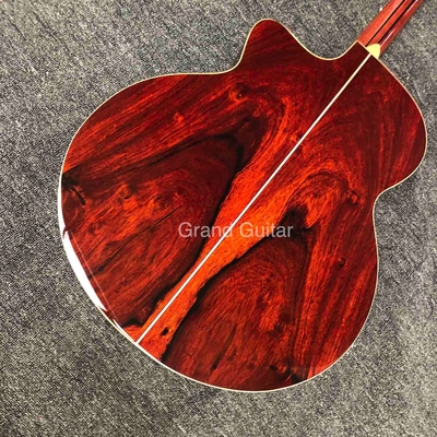 Une guitare acoustique en bois massif de Cocobolo fournisseur