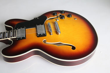 Nouveau style tabac éclatement de l'or de la barque de requin nageoire creuse Guitare électrique la guitare jazz creuse fournisseur