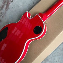Une nouvelle guitare électrique rouge en argent. fournisseur