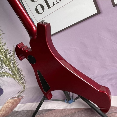 Guitare électrique à 4 cordes irrégulière en forme de corps spécial basse en métal rouge corps solide cou d'érable fournisseur