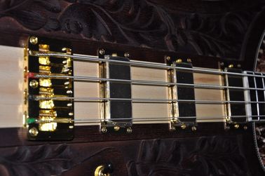 Guitare basse personnalisée Corps de fleur sculpté Cou à travers le corps Guitare basse électrique à 4 cordes 4003 RIC fournisseur