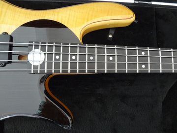 Guitare basse à 4 cordes Fodera guitare basse personnalisée Alder avec haut d'érable flamboyant Corps de conception Taiji MOP logo incrusté fournisseur
