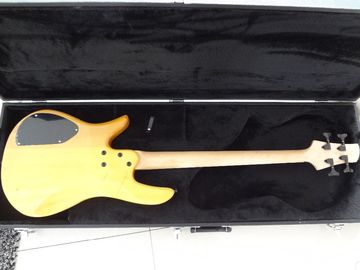 Guitare basse à 4 cordes Fodera guitare basse personnalisée Alder avec haut d'érable flamboyant Corps de conception Taiji MOP logo incrusté fournisseur