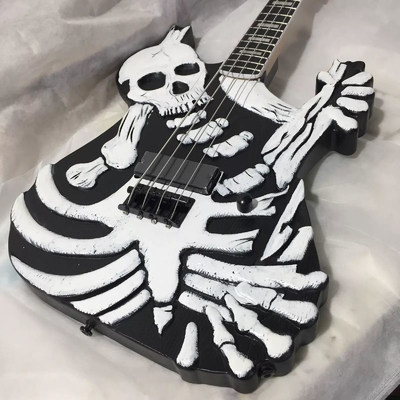 Fabrique George Lynch Crâne Squelette 4 cordes Bass électrique Guitare Basswood Corps fournisseur