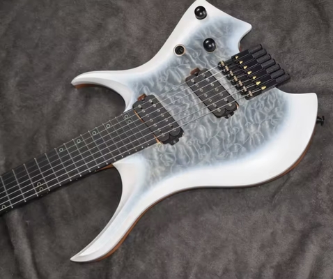 2025 Frets ventilés 7 cordes Guitare électrique sans tête Couleur blanche avec œil Poplar 5 couches Roasted Maple fournisseur
