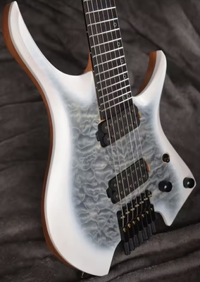 2025 Frets ventilés 7 cordes Guitare électrique sans tête Couleur blanche avec œil Poplar 5 couches Roasted Maple fournisseur