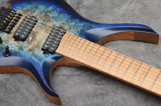 2025 Frets ventilés 7 cordes Guitare électrique sans tête fournisseur