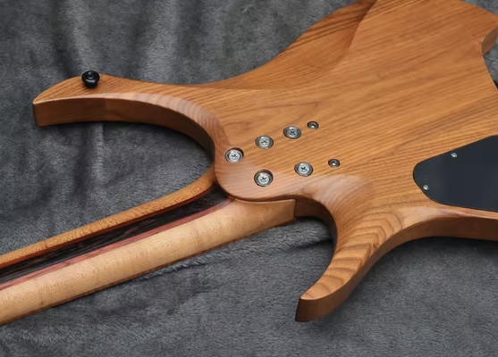 2025 Frets ventilés 7 cordes Guitare électrique sans tête fournisseur