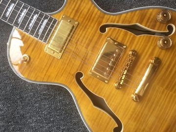 Une guitare jazz personnalisée, une guitare électrique, un double trou en F. fournisseur
