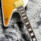 Guitare électrique irrégulière en forme spéciale avec plaque de protection jaune de placage blanc fournisseur