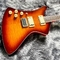 Le LAVAGE de BRÛLURE fait sur commande a formé la guitare électrique gauchère a flambé Tiger Maple Veneer Color peut être adapté aux besoins du client fournisseur